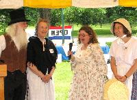 Residents at the Bullet Hill School anniversary add to the festivities.