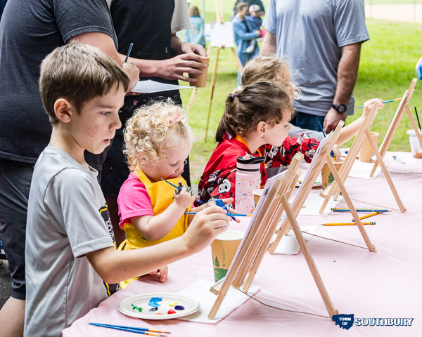 kids painting on easels