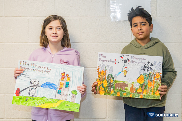 winners with their winning posters