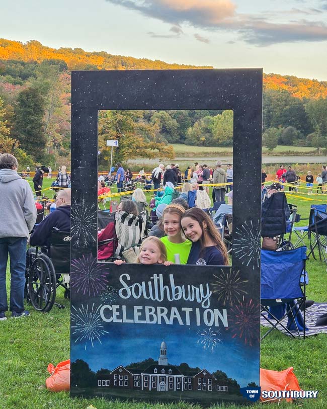 kids in the celebration sign