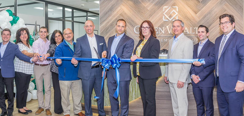 green wealth management ribbon cutting