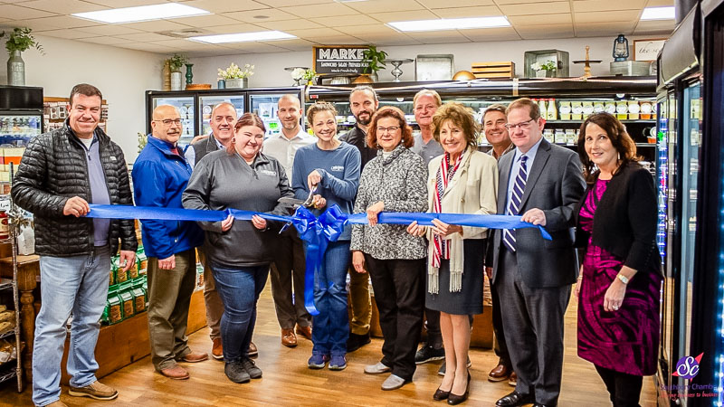 local gourmet ribbon cutting