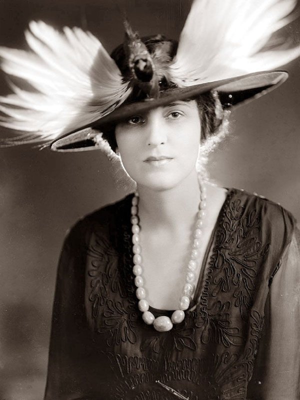 woman with feather hat