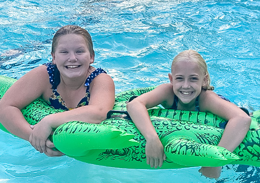 two girls in a pool