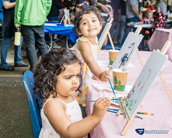 kids painting on easel
